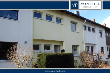 Frontansicht Titelbild - Haus kaufen in Wolfenbüttel - Schönes Reihenmittelhaus am westlichen Stadtrand