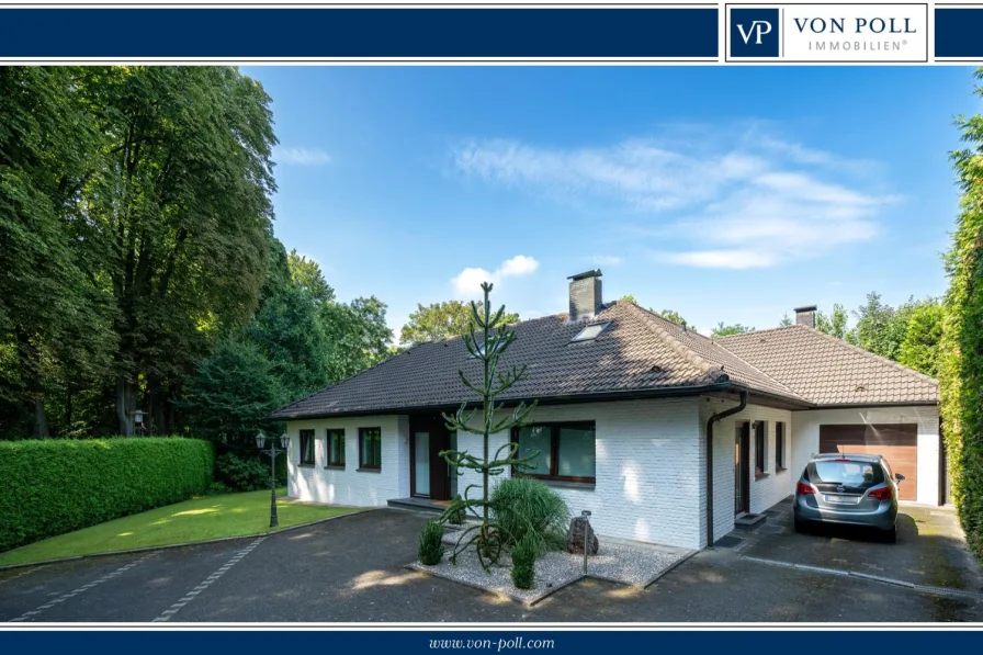 Hausansicht - Haus kaufen in Rheda-Wiedenbrück - Bungalow mit viel Platz im Grünen & Ausbaupotenzial