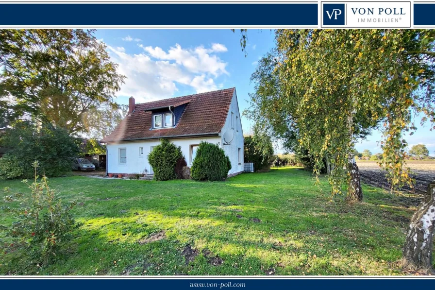 Titelbild - Haus kaufen in Rahden - Einfamilienhaus im Grünen mit viel Land für Individualisten