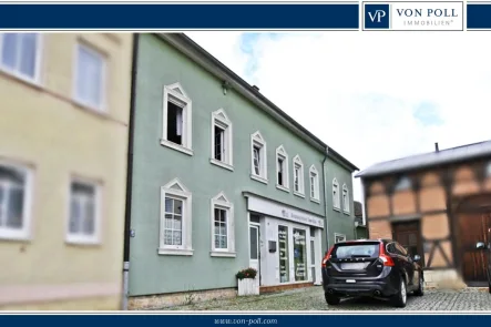 https://www.von-poll.com/de/weimar - Haus kaufen in Kranichfeld - Vermietetes Einfamilienhaus mit Gewerbeeinheit