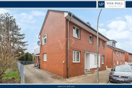 Titelbild - Haus kaufen in Rheine - Mehrfamilienhaus mit Potenzial: Ideal für Investoren, Vermietung oder Mehrgenerationenwohnen