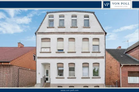 Titelbild - Haus kaufen in Rheine - Voll vermietetes, historisches Dreifamilienhaus in Stadtlage!