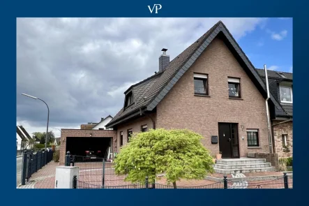 Doppelhaushälfte - Haus kaufen in Osnabrück - Modernisierte Doppelhaushälfte mit neuem Bad, Heizung und großer Terrasse mit Garten