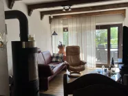 Wohnzimmer mit Balkon