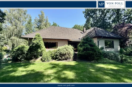 Startbild - Haus kaufen in Schneverdingen - Großzügiger Bungalow mit Vollkeller