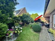 Hintere Wohneinheit Garten mit Terrasse