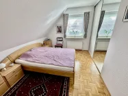 Schlafzimmer mit Einbauschrank