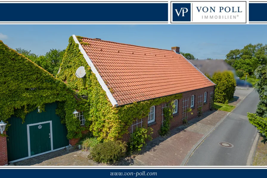 Titelbild - Haus kaufen in Wittmund / Nenndorf - Ebenerdig im Gulfhof-Stil – einzigartige Immobilie bei Wittmund