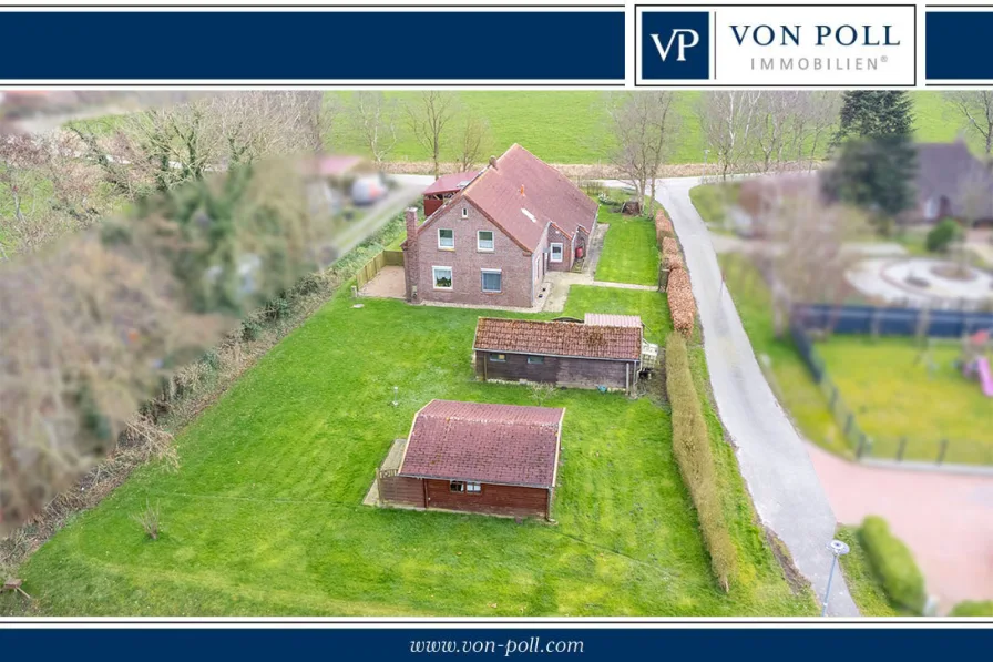 Ansicht - Haus kaufen in Dornum - Landhaus mit Kaminofen und großem Garten in idylischer Lage!