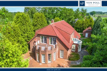 Ansicht - Haus kaufen in Westerholt - Idyllisch gelegenes Landhaus mit Galerie und großzügigem Grundstück