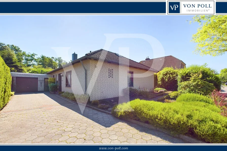 Titelbild - Haus kaufen in Emden / Widdelswehr - Deichnaher Winkelbungalow  Komfort und Natur vereint