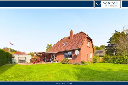 Titelbild - Haus kaufen in Moormerland / Hatshausen - Willkommen im Glück: Ein Zuhause für die ganze Familie