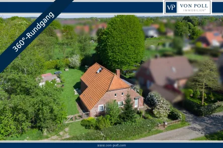 Titelbild - Haus kaufen in Wiesmoor - Solides Handwerkerhaus mit großem Grundstück in Wiesmoor