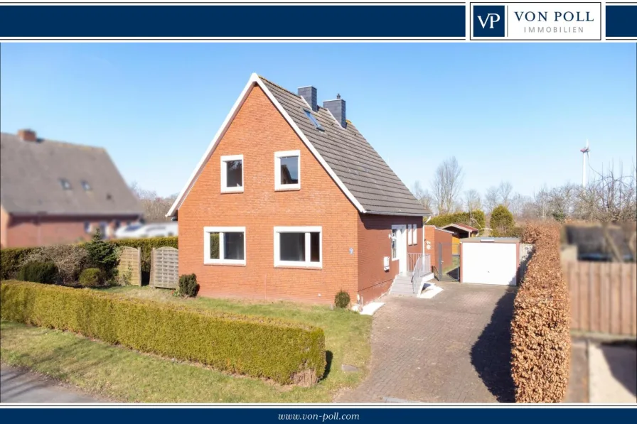 Titelbild - Haus kaufen in Emden - Jarssum - Gepflegtes Einfamilienhaus mit Nebengebäude und idyllischem Gartenblick