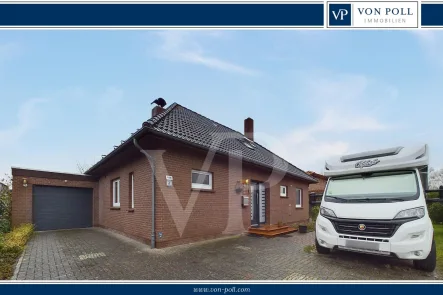 Titelbild - Haus kaufen in Westoverledingen - Moderner Bungalow mit großzügigem Raumkonzept