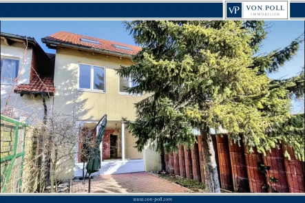 Hausrückansicht - Haus kaufen in Friedersdorf - Geräumiges Reihenmittelhaus mit Garten in beliebter Lage in Friedersdorf