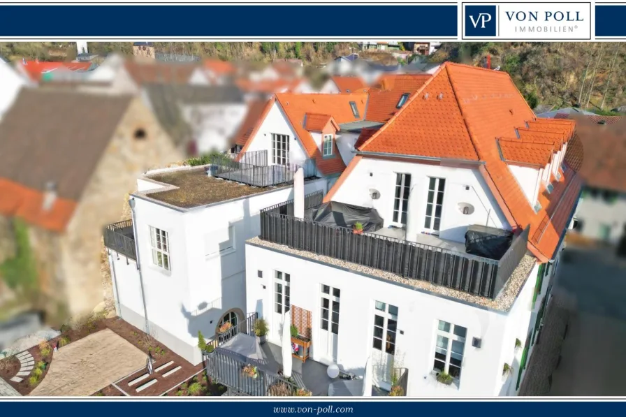 Titelbild - Wohnung kaufen in Laudenbach - Neuwertige Eigentumswohnung mit Dachterrasse