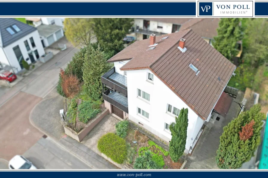 Titelbild - Haus kaufen in Weinheim - Einfamilienhaus auf großem Eckgrundstück mit Blick in die Rheinebene