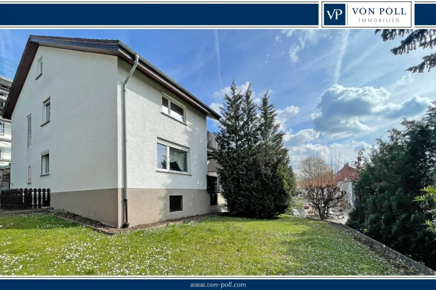 Titelbild - Haus kaufen in Weinheim - Zweifamilienhaus mit großem Potenzial und herrlichem Blick über die Rheinebene!