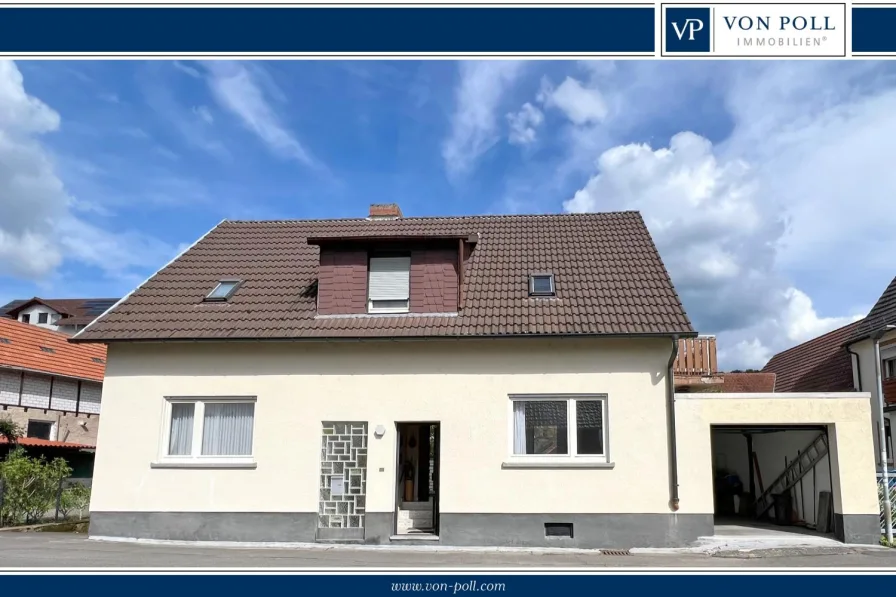 Titelbild - Haus kaufen in Weinheim / Lützelsachsen - Charmantes Einfamilienhaus zu einem fairen Preis.