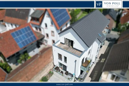 Titelbild - Wohnung kaufen in Weinheim / Sulzbach - Neuwertige Erdgeschosswohnung mit Terrasse und Top Energieeffizienz!