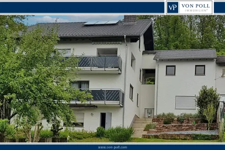 Titelbild - Haus kaufen in Mörlenbach / Groß Breitenbach - Geräumiges Zweifamilienhaus mit großem Garten in idylischer Lage