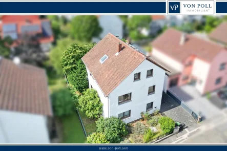 Titelbild - Haus kaufen in Eppelheim - Sanierungsbedürftiges Zweifamilienhaus mit großem Garten und viel Potenzial