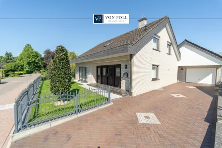 Titelbild - Haus kaufen in Neuenhaus - Topgepflegtes Einfamilienhaus in Neuenhaus