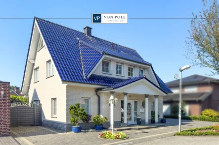 Titebild - Haus kaufen in Nordhorn/Oorde - Gartenparadies trifft Wohnkomfort: 164m² Wohn- und Nutzfläche in der besten Lage von Nordhorn