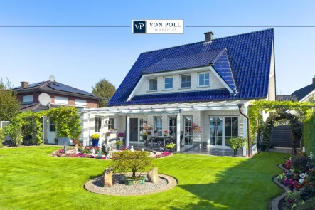 Titelbild - Haus kaufen in Nordhorn/Oorde - Gartenparadies trifft Wohnkomfort: 164m² Wohn- und Nutzfläche in der besten Lage von Nordhorn