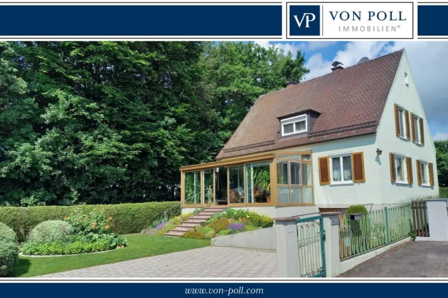 Titelbild - Haus kaufen in Tapfheim - Einzigartiges Wohnen in begehrter Lage: Stilvolles Einfamilienhaus mit Wintergarten und Blockhaus