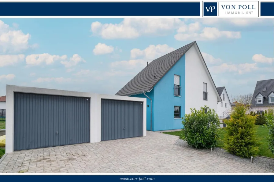 Titelbild - Haus kaufen in Asbach-Bäumenheim - Neuwertiges Einfamilienhaus mit Doppelgarage und Garten in ruhiger Lage