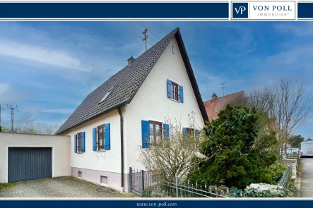 Titelbild - Haus kaufen in Donauwörth / Neudegger Siedlung - Attraktives Einfamilienhaus mit Garten und Garage in zentrumsnaher Lage