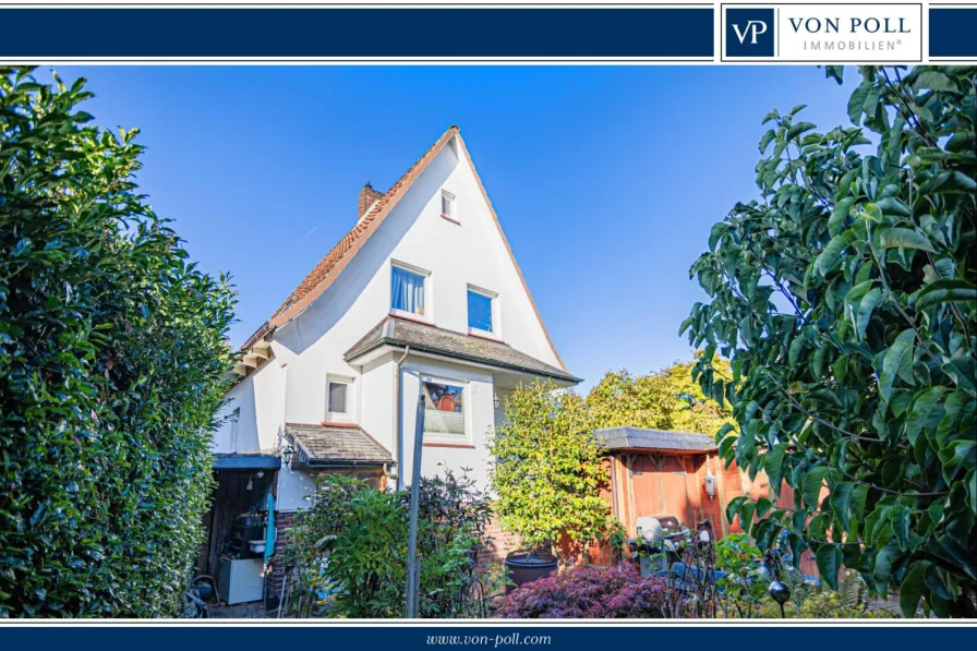 Titelbild - Haus kaufen in Buxtehude - Gemütliches Einfamilienhaus mit Kamin in Altstadtnähe