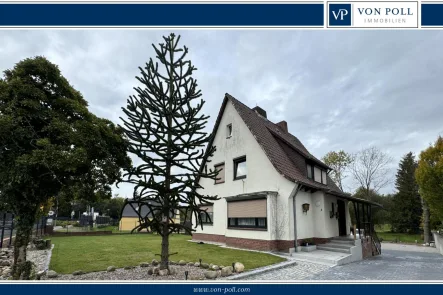 Titelbild - Haus kaufen in Bremervörde - Geräumiges Einfamilienhaus mit Einliegerwohnung in zentraler Lage