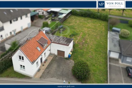 Titelbild - Haus kaufen in Kall - Umfangreich modernisiertes Einfamilienhaus mit Option einer zweiten Bebauung auf großem Grundstück am Rande von Kall