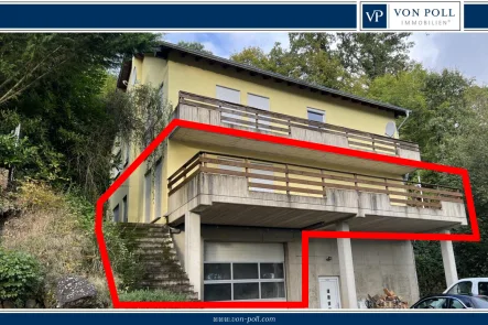 Seitenansicht - Wohnung kaufen in Mechernich - 3-Zimmer-Wohnung mit großzügiger Garage/Werkstatt in schöner Höhenlage