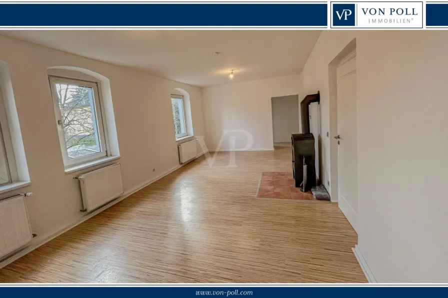 Wohnzimmer mit Kaminofen - Wohnung kaufen in Velbert - Gemütliches Zuhause in zentraler Lage – Modern und einladend