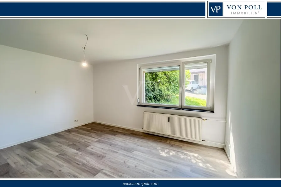 Wohnzimmer - Wohnung kaufen in Heiligenhaus - Modernisierte Wohnung in zentraler Lage mit guter Energieeffizienz