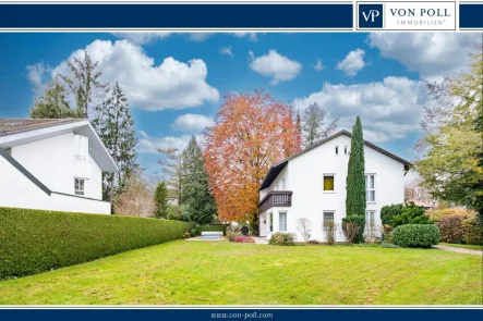 Titelbild - Haus kaufen in Gräfelfing - Freistehendes Einfamilienhaus in erstklassiger Lage von Gräfelfing mit Garten und Outdoorpool