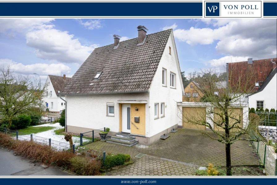 Titelbild - Haus kaufen in Halle (Westf.) - Gemütliches Kleinod in kinderfreundlicher Wohnlage | 2 Garagen | Halle (Westf.)