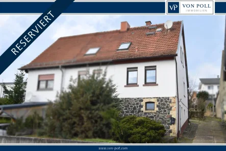 Hausansicht - Haus kaufen in Büdingen / Wolferborn - DOPPELHAUSHÄLFTE MIT GROßEM GRUNDSTÜCK