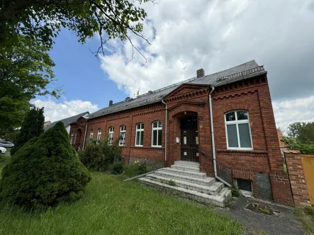 Straßenansicht - Haus kaufen in Plattenburg OT Kletzke - Attraktives Wohnhaus mit Remise und zusätzlichem Grundstück in Kletzke