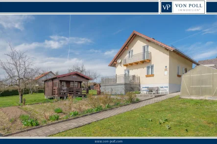 Titelbild - Haus kaufen in Eging am See - Charmantes Einfamilienhaus mit Nebengebäuden und großem Grundstück im Zentrum von Eging am See