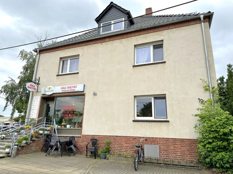 Wohn- und Geschäftshaus mit Einliegerwohnung