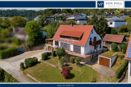 Titelbild - Haus kaufen in Untermünkheim / Haagen - Modernes familienfreundliches Zweifamilienhaus mit vielen Highlights und weiterem Ausbaupotenzial