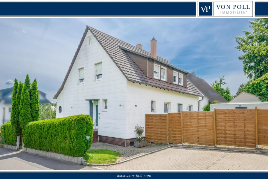 Titelbild - Haus kaufen in Mötzingen - Einfamilienhaus mit zwei separaten Wohnungen in Feldrandlage von Mötzingen