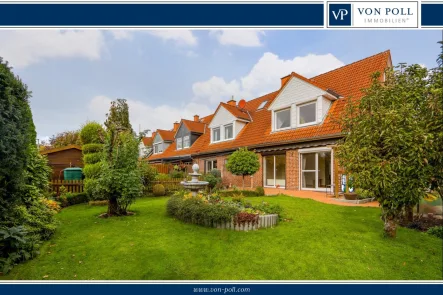 Tietelbild - Haus kaufen in Hannover - Attraktives Reihenendhaus mit ausgebautem Dachgeschoss, Kamin und großzügigem Garten