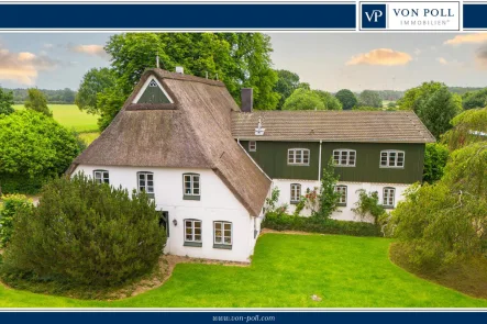 Titelbild  - Haus kaufen in Rosdorf - Historischer Kastanienhof mit drei Wohneinheiten in ländlicher Idylle