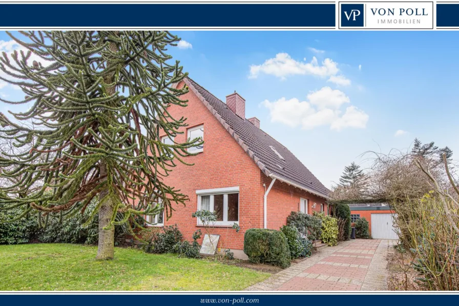 Titelbild  - Haus kaufen in Flintbek - Familienparadies mit viel Platz in ruhiger Lage von Flintbek